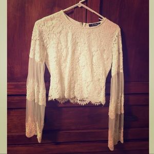 Bright white lace crop top.